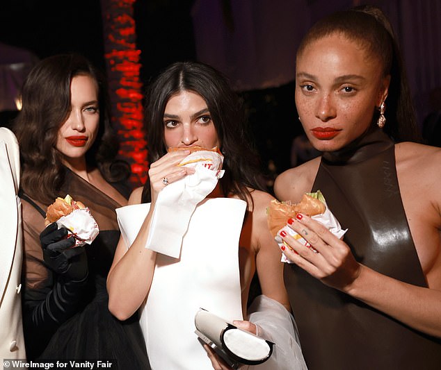 Irina Shayk, Emily Ratajkowski and Adwoa Aboah all posed for the camera with their burgers, while Diane Kruger munched on one as she left the party