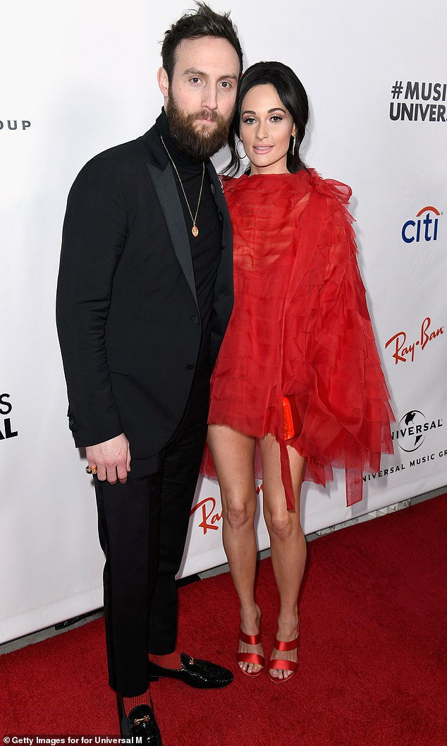 The couple were first linked in June 2021, nearly a year after Kacey and her songwriter husband Ruston Kelly announced their divorce; Kacey and Ruston are pictured in 2019