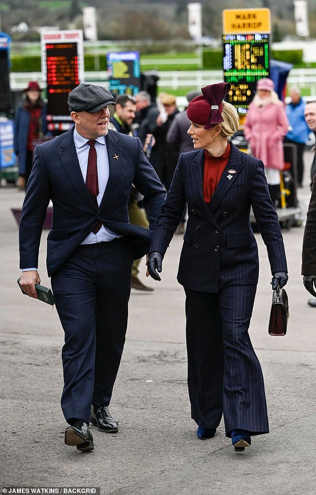 Princess Anne's daughter completed her ensemble with minimal gold jewelery and a chic burgundy suede fascinator