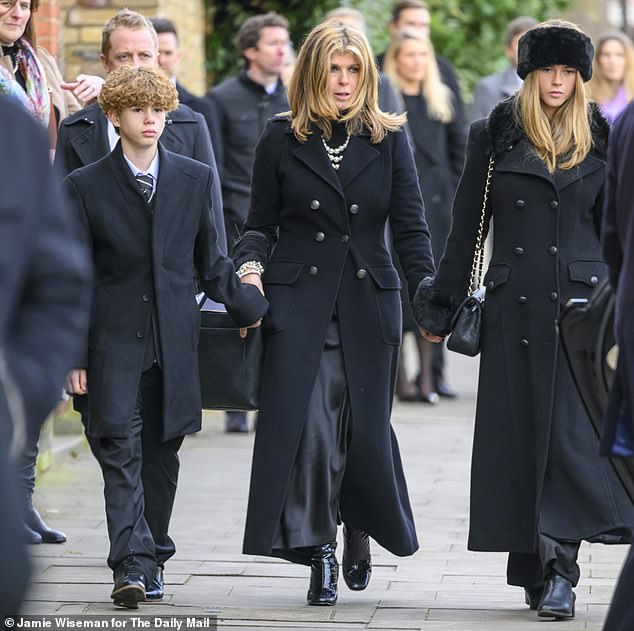 Kate and her children - Darcey, 17, and William, 14 - are seen in black as they leave Derek's funeral last month