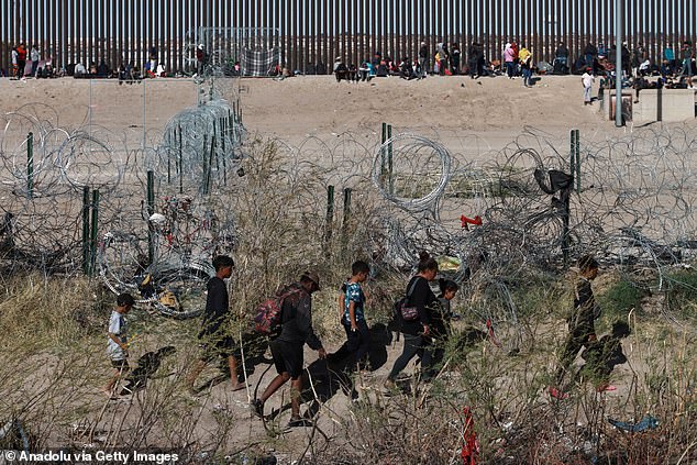 Migrants continue to cross the border between El Paso, Texas and Ciudad Juarez, Mexico