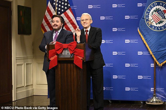 Bryant dons a fake beard while playing Cruz on SNL, and she stands next to Kate McKinnon, who portrayed Dr.  Anthony Fauci in an episode of SNL on December 11, 2021