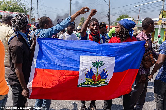 Haiti plunged into chaos after crime boss Jimmy 'Barbecue' Cherizier took control and called for a 'bloody uprising'