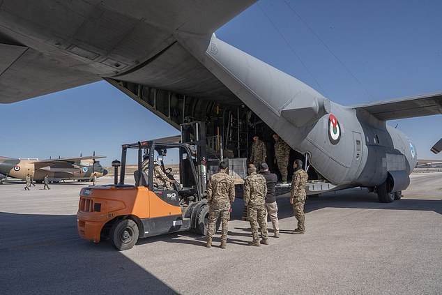 Aid being loaded onto C-130 by Jordanian airmen at King Abdullah II Air Base before heading to Gaza
