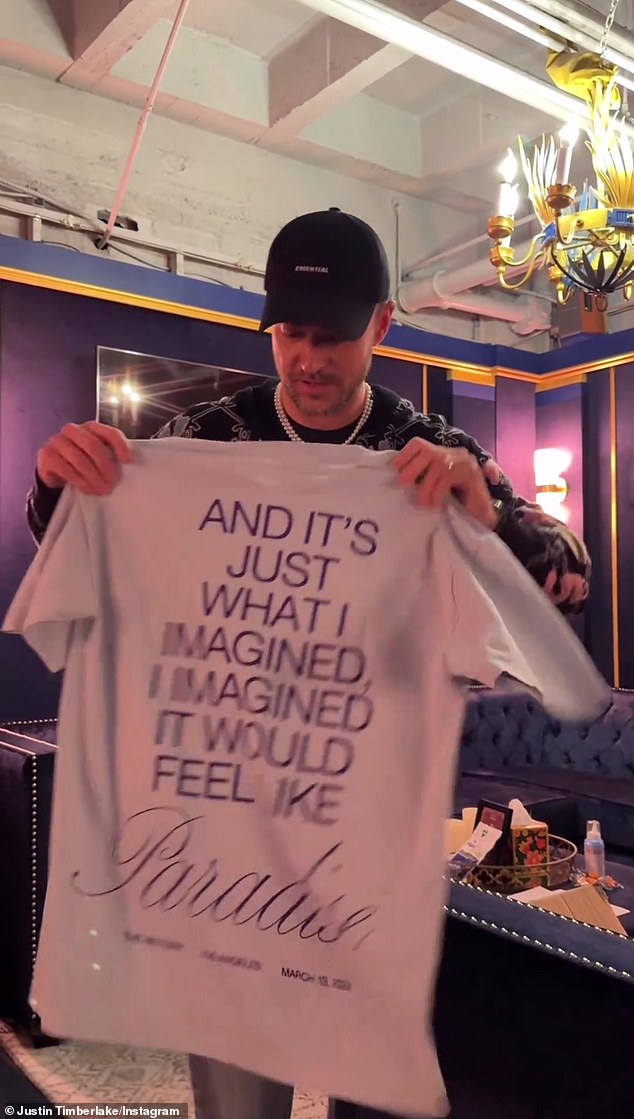 He opened a box and showed the front and back of a T-shirt with the lyrics to his new collaborative song with NSYNC titled Paradise