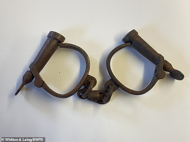 He died aged 75 in 1920 and his collection, which includes his handcuffs, sold for a century at