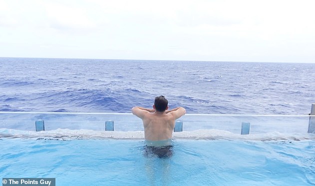 Above is Nicky hanging out at Infinity Beach's eye-catching infinity pool, which is open to all guests.
