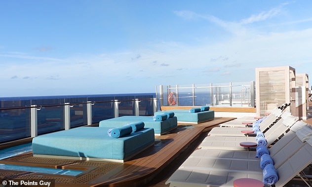This image shows the sun lounger area at Infinity Beach.
