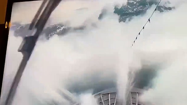 Terrifying images show huge wave crashing into Norwegian ship, causing a power outage