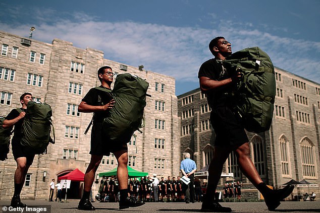 Gilland also pointed out that West Point's mission statement has changed nine times in the past.  Pictured: New cadets march in a campus courtyard during Reception Day at the United States Military Academy at West Point