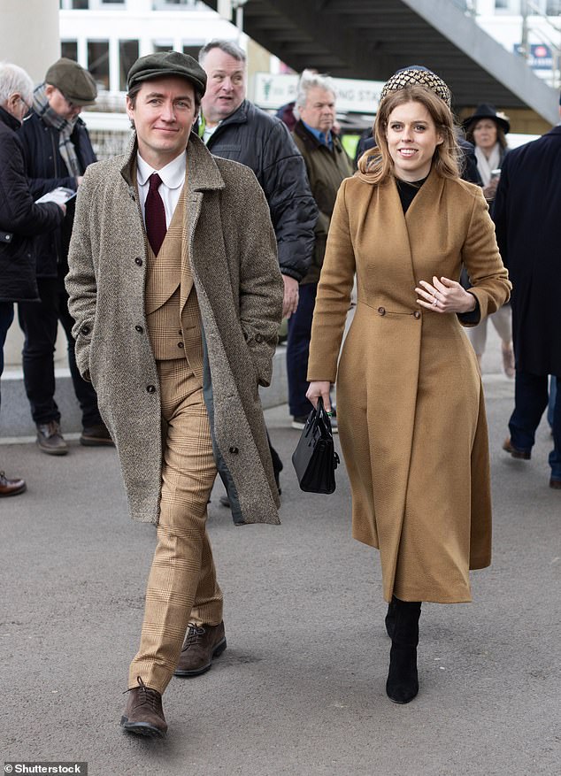 Edo opted for a Del Boy-esque look with a flat cap and gray coat, while Beatrice also opted for neutral tones