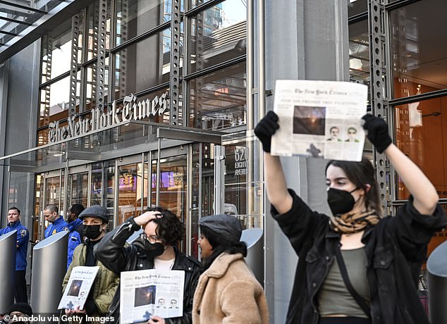NYPD officials said 124 people were arrested outside the Times' Midtown headquarters