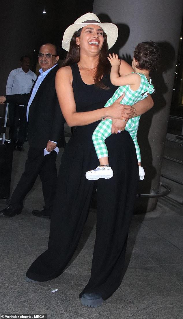 The 41-year-old Indian actress and producer took her little one on a trip to her homeland and looked in good spirits