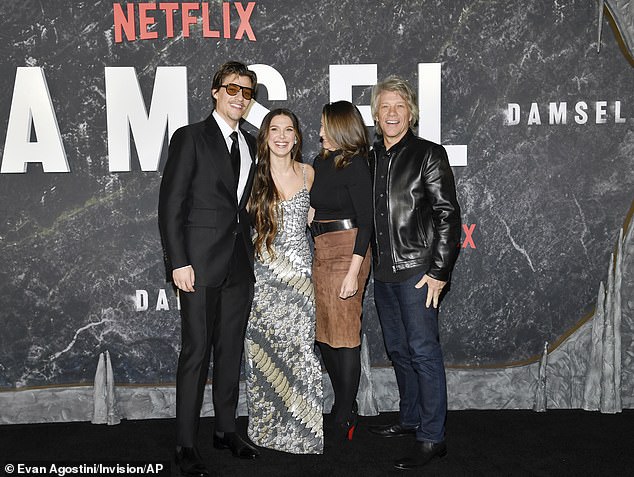 from left: Jon's son Jake Bongiovi, left, Millie Bobby Brown, Dorothea Bongiovi and Jon at the premiere of Netflix's"Damsel at the Paris Theater in March in New York