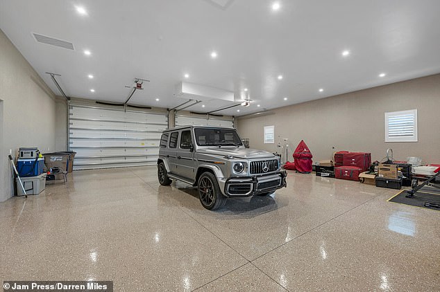 A 12-car garage also provides ample storage space