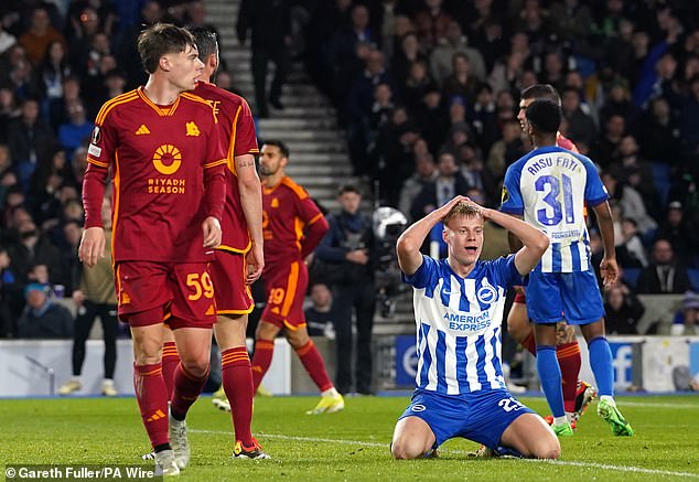 Jan Paul van Hecke puts his hands on his head after wasting a golden opportunity for Brighton