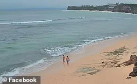 A member of the Bali Travel Forum shared this webcam screenshot of two people walking on the beach below Nyepi