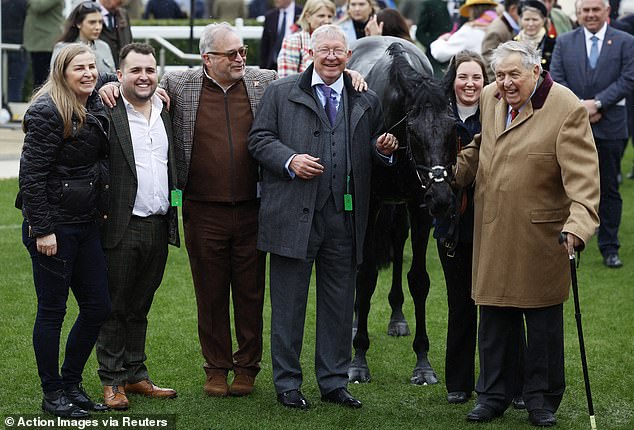 Sir Alex was pictured celebrating with his horse Monmiral after it won the Pertemps Network Final at Cheltenham today