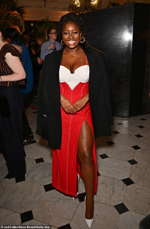 British radio presenter Clara Amfo, 39, looked sensational in a leggy thigh-high split red and white dress as she arrived at the event