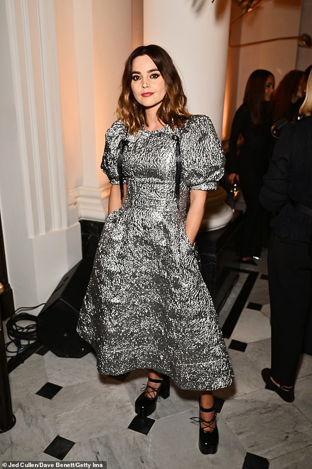Jenna Coleman, 37, put on quite a show as she wore a striking metallic dress with peplum sleeves, teamed with lace platform heels