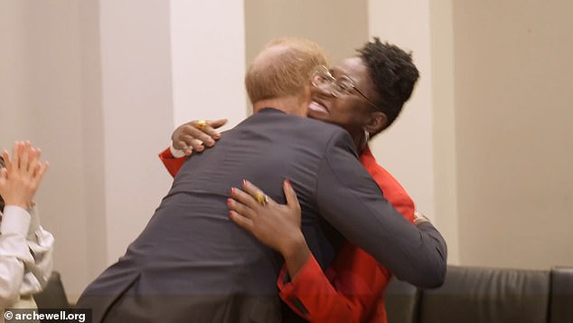 Prince Harry - who recently fought back claims he entered the country illegally due to taking illegal drugs - also warmly embraces Buolamwini, who appears next to him after driving into the royals .