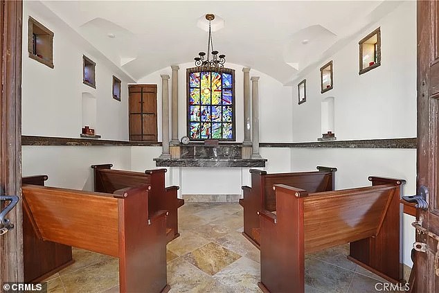 The property includes a serene chapel with stained glass windows and hand-carved Indian temple doors