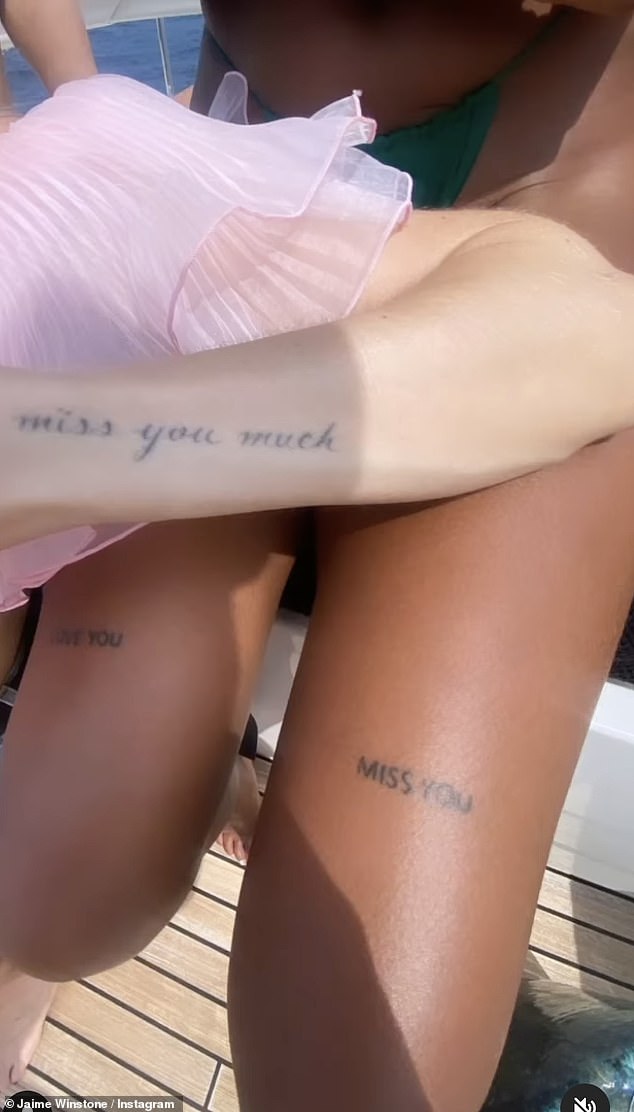 She showed off some of her friends' tattoos which appeared to match, with one person having written 'miss you so much' on their arm, while another showed the writing 'MISS YOU'.