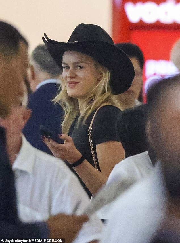 trip to Texas on Friday. Madeleine had brought home a souvenir from the States and strutted through Sydney Airport with a big black cowboy hat on her head