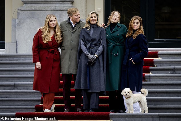 A part of the family!  Mambo posed perfectly for a family photo together with Princess Amalia, King Willem-Alexander, Queen Máxima, Princess Ariane and Princess Alexia