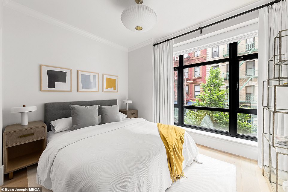 A master suite features a massive walk-in closet, en-suite bathroom, and a 1,450-square-foot private terrace