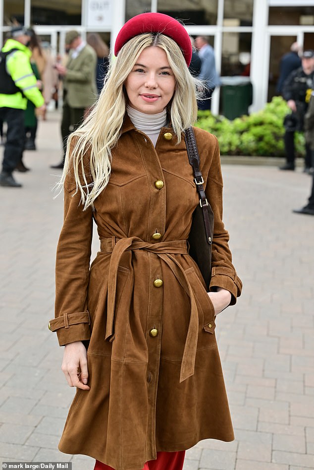 Former Made In Chelsea star Georgia Toffolo looked chic in a retro brown suede coat teamed with a red headband