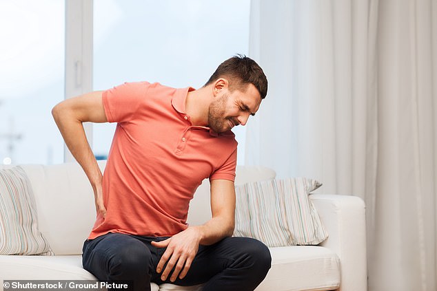 Sleeping on your stomach can leave you with back and neck pain the next day, experts say (file image)