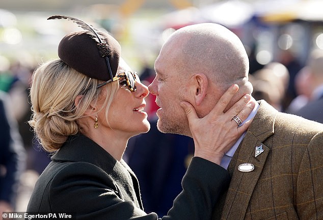 A kiss goodbye to Cheltenham! Zara and Mike leaned in for a chat as they split up to hang out with their friends