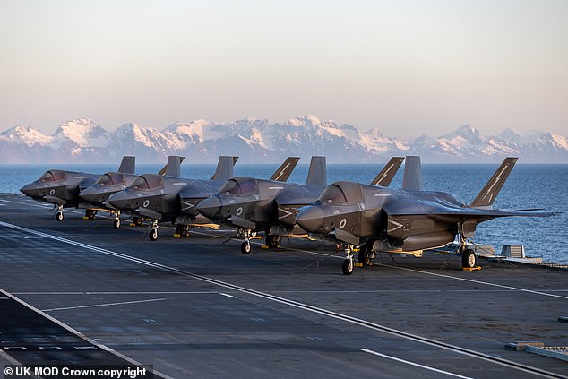 F-35 B Lightning aircraft from 617 Squadron lined up on the flight deck of HMS Prince of Wales at dawn during Exercise NORDIC RESPONSE 24 (File)
