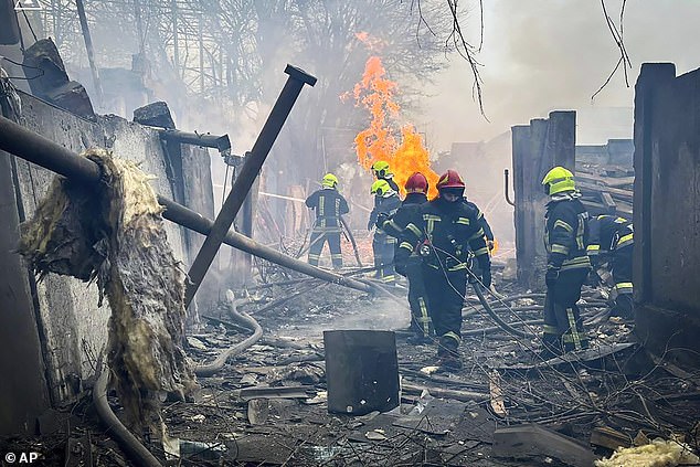 Emergency services work at the scene of a Russian attack in Odesa, Ukraine, Friday, March 15