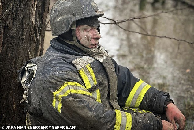 An injured rescuer was left covered in dirt and with a large tear in his jacket after the chaos