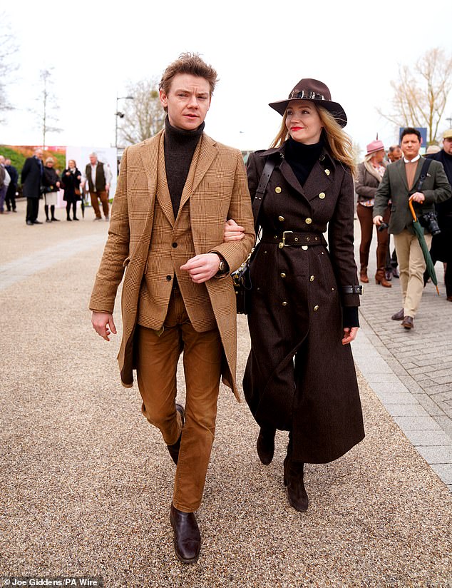 Talulah, who was married to Elon Musk from 2013 to 2016, was a vision in her chic look, which consisted of a feather-brimmed fedora and a belted brown coat