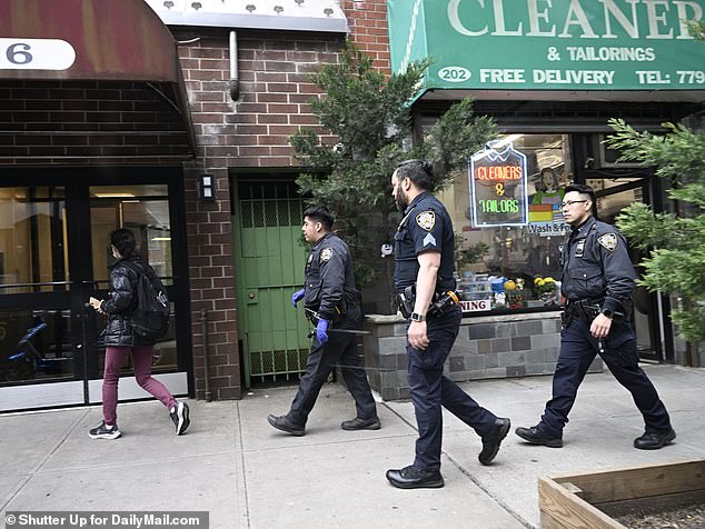 NYPD officers remained at the property Friday as the victim's family searched for answers