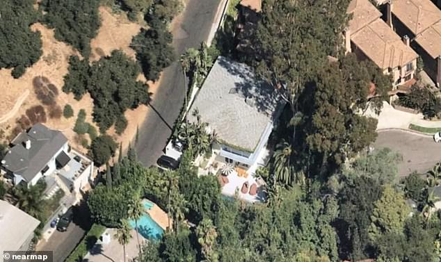 Cara bought her his 8,000-square-foot mansion for $7 million in 2019 (pictured above)