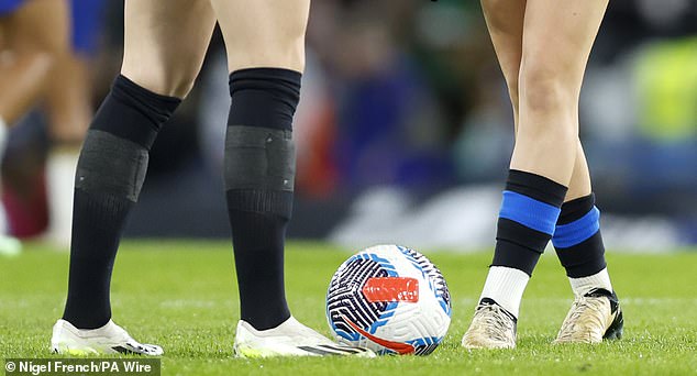 The Gunners will now wear Chelsea's away socks but were forced to put tape over the Nike logo.