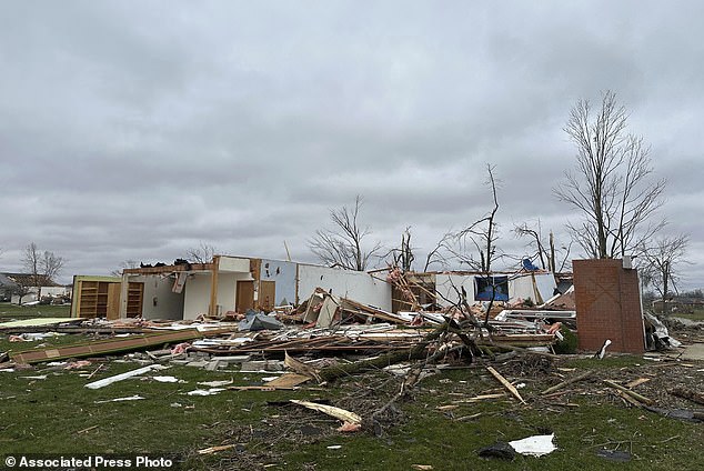The remains of a destroyed church are seen in Winchester, Ind., Friday, March 15, 2024, after it was destroyed in a storm that hit the area Thursday night. (AP Photo/Isabella Volmert)