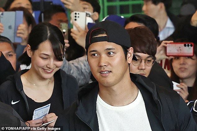 Ohtani's wife is former Japanese basketball player Mamiko Tanaka (L), who retired in 2023