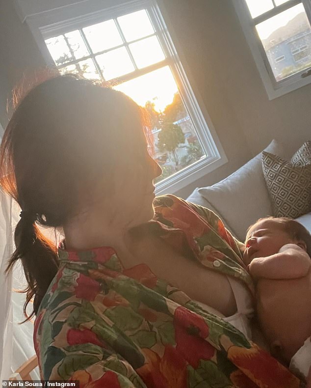 After returning home from hospital, the new mum-of-three shared a selfie snap of herself cradling baby Giulia