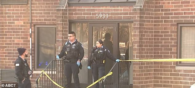 Pictured: Police outside the family's apartment complex investigating the crime scene
