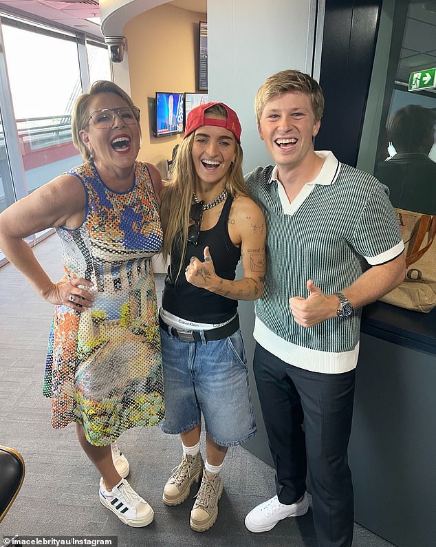 Her hint came just a day after the official I'm A Celebrity Australia Instagram shared a snap of her partner G Flip posing with hosts Julia Morris and Robert Irwin