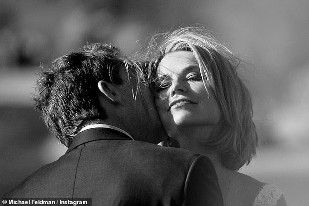 He also included an affectionate black-and-white photo showing him kissing the media personality's cheek