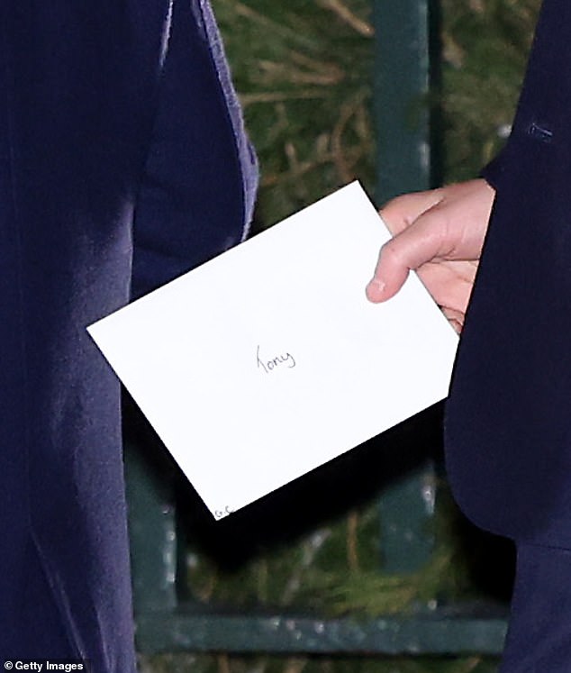 Prince George appeared to post a Christmas letter to a 'Tony' before entering Westminster Abbey