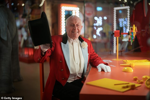 British veteran champion Norman Barrett MBE poses next to an interactive exhibition of himself at Showtown, Blackpool's first ever permanent museum