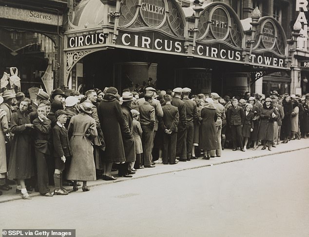 Crowds of people queuing outside Tower Circus, Blackpool in the 1930s