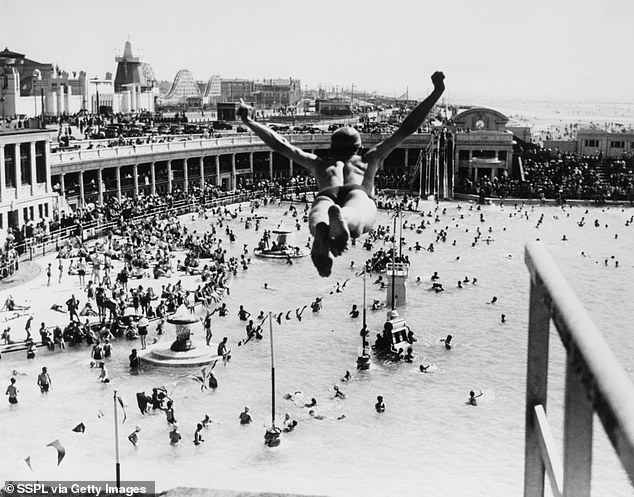 Man dives into an overcrowded swimming pool in Blackpool in August 1937